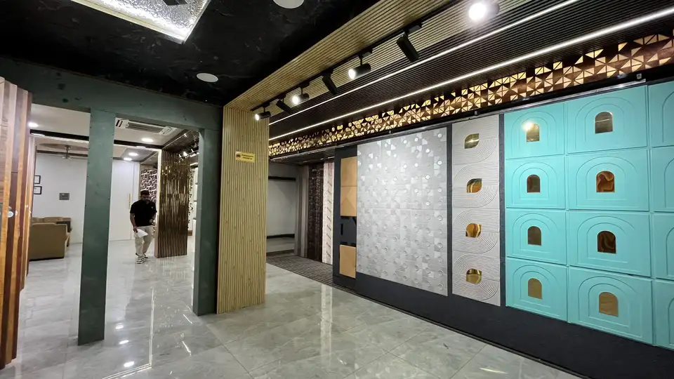 Bright showroom interior with wall finishes and product samples on display